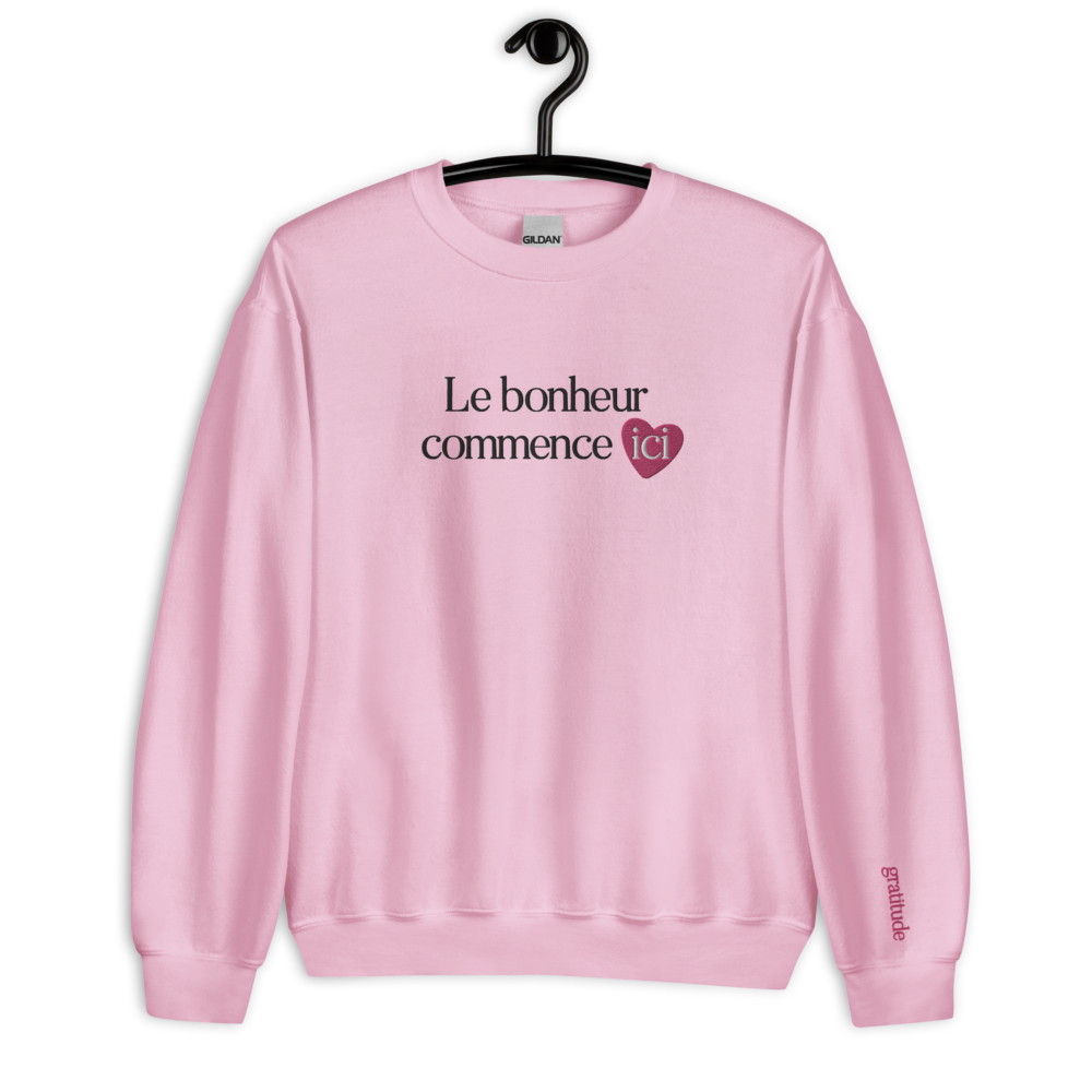 Sweat-shirt positif "Le bonheur commence ici" rose