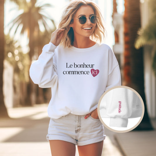 Sweat-shirt positif "Le bonheur commence ici" rose